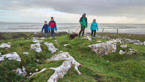 Family walkers with dog at Humphrey Head Wildey Media