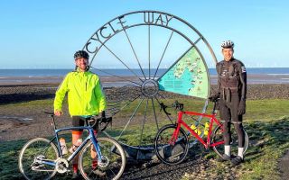 Joseph and Sam setting off on the Bay Cycle Way at Sandy Gap